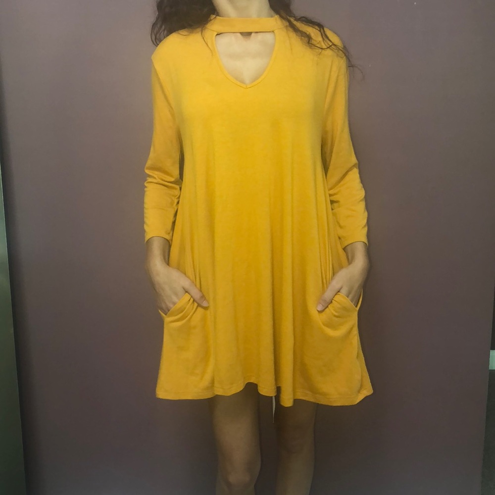 Three quarter length dress with pockets